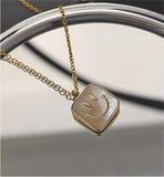 Smiley Face Mother of Pearl Square Necklace in Golden Titanium Steel