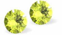 Sparkly Austrian Crystal Diamond-shape and Elegant Stud Earrings Round, Multi Faceted Crystal  4mm and 6mm in size Colour: Bright Citrus Green Delivered in a soft, black, velveteen pouch Perfect for an evening out or sophisticated, elegant day wear.