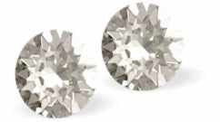 Sparkly Austrian Crystal Diamond-shape and Elegant Stud Earrings Round, Multi Faceted Crystal, 6mm and 7mm in size Colour: Sparkling Silver Shade Sterling Silver Earwires Delivered in a soft, black, velveteen pouch