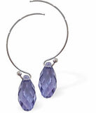 Sparkly Tanzanite Briolette Crystal Drops on Hoop Earrings Colour: Tanzanite Purple Rhodium Plated 36mm in size Hypoallergenic; Free from cadmium, lead and nickel Delivered in a soft, black, velveteen pouch