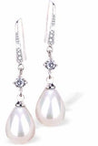 White Long Teardrop Pearl Antiquey Drop Earrings Colour: White Rhodium Plated 23mm in size Hypoallergenic; Free from cadmium, lead and nickel Delivered in a soft, black, velveteen pouch