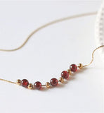 Garnet Drop Necklace Garnet: for love and friendship working with your inner fire and life force. 40cm in size Hypoallergenic: Nickel, Lead and Cadmium Free Delivered in a soft, black, velveteen pouch