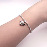 Stretch Charm Bracelet with Silver Coloured Beads and Aileen Highland Cow Charm