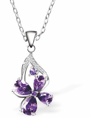 Delicate Tanzanite Purple Daisy Necklace 29mm in size Choice of 18" Stainless Steel or Sterling Silver Chains Hypoallergenic; Free from cadmium, lead and nickel Delivered in a soft, black, velveteen pouch