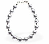 Austrian Crystal String of Pearls and Crystal Mix Bracelet Colour: Light Grey and crystal mix Size: 42cm from clasp to clasp. See matching necklace (CP186) and drop earrings (CP188) Delivered in a soft, black, velveteen pouch