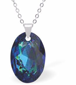 Embellished with Crystals by Swarovski® Multi Faceted Oval Elliptic Necklace Bermuda Blue in Colour 16mm in size Choice of 18" Stainless Steel or Sterling Silver Chain Hypo allergenic: Free from Lead, Nickel and Cadmium See matching earrings EL59 Delivered in a soft, grey, velveteen pouch