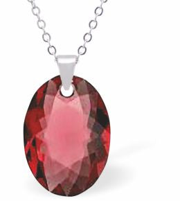 Embellished with Crystals by Swarovski® Multi Faceted Oval Elliptic Necklace Scarlet Red in Colour 16mm in size Choice of 18" Stainless Steel or Sterling Silver Chain Hypo allergenic: Free from Lead, Nickel and Cadmium See matching earrings EL65 Delivered in a soft, grey, velveteen pouch