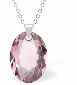 Embellished with Crystals by Swarovski® Multi Faceted Oval Elliptic Necklace Light Rose Pink in Colour 16mm in size Choice of 18" Stainless Steel or Sterling Silver Chain Hypo allergenic: Free from Lead, Nickel and Cadmium See matching earrings EL67 Delivered in a soft, grey, velveteen pouch