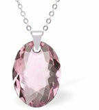 Austrian Crystal Multi Faceted Oval Elliptic Necklace Light Rose Pink in Colour 16mm in size Choice of 18" Stainless Steel or Sterling Silver Chain Hypo allergenic: Free from Lead, Nickel and Cadmium See matching earrings EL67 Delivered in a soft, black, velveteen pouch