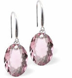 Austrian Crystal Multi Faceted Oval Elliptic Drop Earrings Rose Pink in Colour 11.5mm in size - Rhodium Plated Earwires Hypo allergenic: Free from Lead, Nickel and Cadmium See matching necklace EL66 Delivered in a soft, black, velveteen pouch