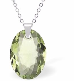 Embellished with Crystals by Swarovski® Multi Faceted Oval Elliptic Necklace Peridot Green in Colour 16mm in size Choice of 18" Stainless Steel or Sterling Silver Chain Hypo allergenic: Free from Lead, Nickel and Cadmium See matching earrings EL69 Delivered in a soft, grey, velveteen pouch