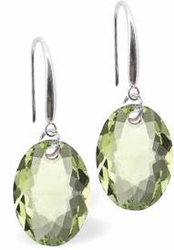 Austrian Crystal Multi Faceted Oval Elliptic Drop Earrings Peridot Green in Colour 11.5mm in size - Rhodium Plated Earwires Hypo allergenic: Free from Lead, Nickel and Cadmium See matching necklace EL68 Delivered in a soft, black, velveteen pouch