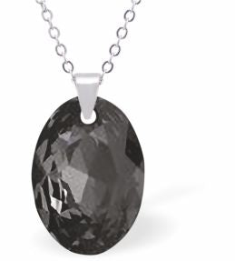 Embellished with Crystals by Swarovski® Multi Faceted Oval Elliptic Necklace Silver Night Grey in Colour 16mm in size Choice of 18" Stainless Steel or Sterling Silver Chain Hypo allergenic: Free from Lead, Nickel and Cadmium See matching earrings EL75 Delivered in a soft, grey, velveteen pouch