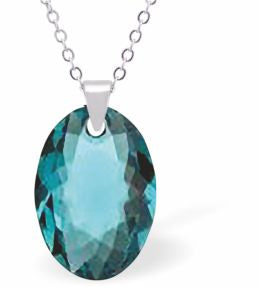 Embellished with Crystals by Swarovski® Multi Faceted Oval Elliptic Necklace Blue Zircon in Colour 16mm in size Choice of 18" Stainless Steel or Sterling Silver Chain Hypo allergenic: Free from Lead, Nickel and Cadmium See matching earrings EL81 Delivered in a soft, grey, velveteen pouch