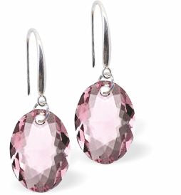 Austrian Crystal Multi Faceted Oval Elliptic Drop Earrings Light Rose Pink in Colour 11.5mm in size - Rhodium Plated Earwires Hypo allergenic: Free from Lead, Nickel and Cadmium See matching necklace EL82 Delivered in a soft, black, velveteen pouch