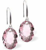 Austrian Crystal Multi Faceted Oval Elliptic Drop Earrings Light Rose Pink in Colour 11.5mm in size - Rhodium Plated Earwires Hypo allergenic: Free from Lead, Nickel and Cadmium See matching necklace EL82 Delivered in a soft, black, velveteen pouch