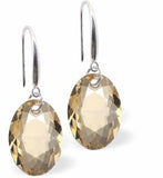 Austrian Crystal Multi Faceted Oval Elliptic Drop Earrings Golden Shadow in Colour 11.5mm in size - Rhodium Plated Earwires Hypo allergenic: Free from Lead, Nickel and Cadmium See matching necklace EL84 Delivered in a soft, black, velveteen pouch