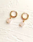 Golden Hoop with Natural Pink Crystal Earrings, 30mm in size Hypoallergenic: Nickel, Lead and Cadmium Free Delivered in a soft, black, velveteen pouch