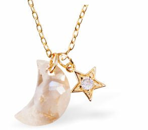 Golden Coloured Moon and Star Necklace
15mm, Rhodium Plated

18" Chain, Golden Chain and Frame
Hypoallergenic: Nickel, Lead and Cadmium free
Delivered in a soft, black, velveteen pouch