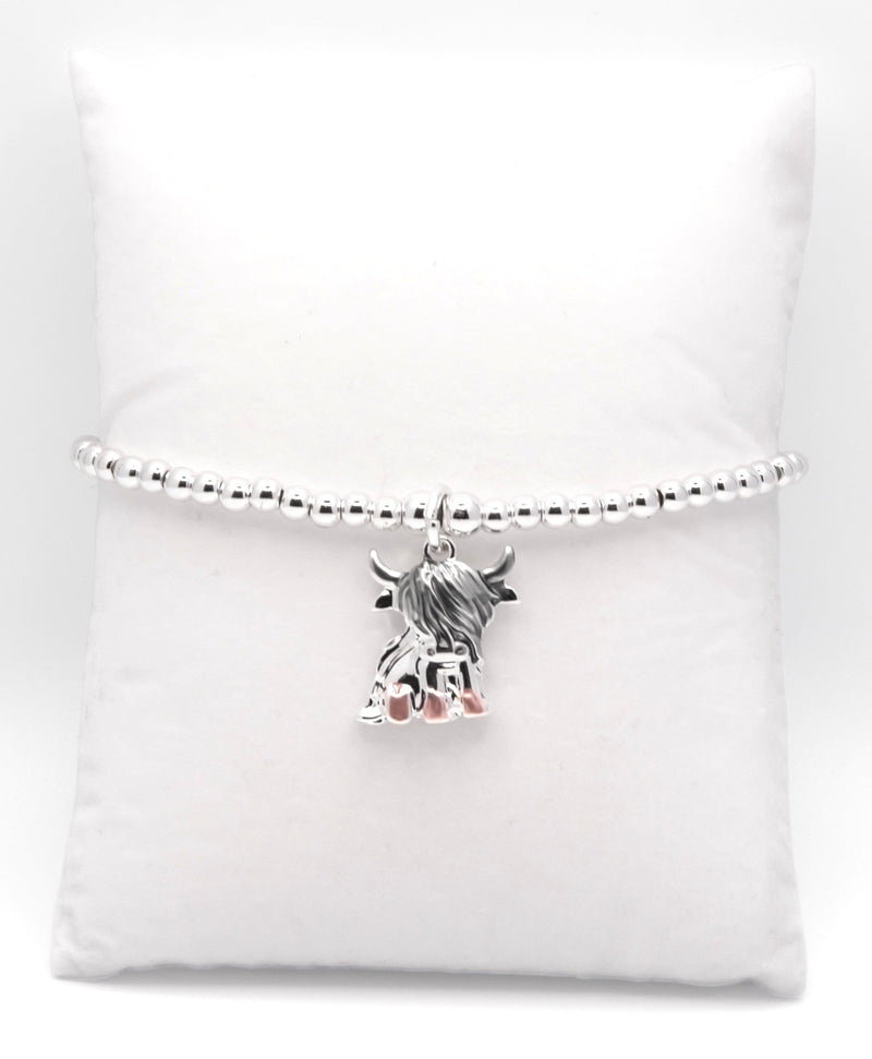 Stretch Charm Bracelet with Silver Coloured Beads and Twyla Highland Cow Charm