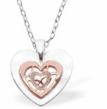 Heart in Heart Necklace Rose Gold and Silver Colour Rhodium Plated Hypoallergenic; Free from cadmium, lead and nickel 21mm in size with 18" Chain See matching drop earrings K615 Delivered in a soft, black, velveteen pouch