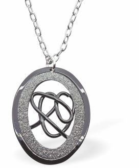 Black and Grey Glitzy Oval Necklace Rhodium Plated, Hypoallergenic; Lead, Cadmium and Nickel Free 38mm in size Colour: Brown, Gold and Silver Chain: Rhodium Plated, 18" / 3" Extension Delivered in a soft, black, velveteen pouch