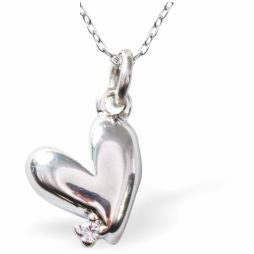 Dainty Heart Necklace, Silver Coloured Heart Pendant
Hypoallergenic: Nickel, Lead and Cadmium Free
11mm in size
Colour: Silver Coloured
Chain: 18" Rhodium Plated
Delivered in a soft, black, velveteen pouch