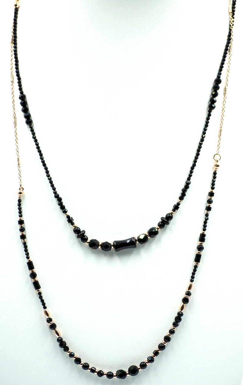 Long Mixed Double Chain Black Beaded Gold Plated Necklace

Black Bead&nbsp;140cm in size
Colour: Black
Chain: Gold Plated Chain
See matching drop earrings LB37
Delivered in a soft, grey, velveteen pouch