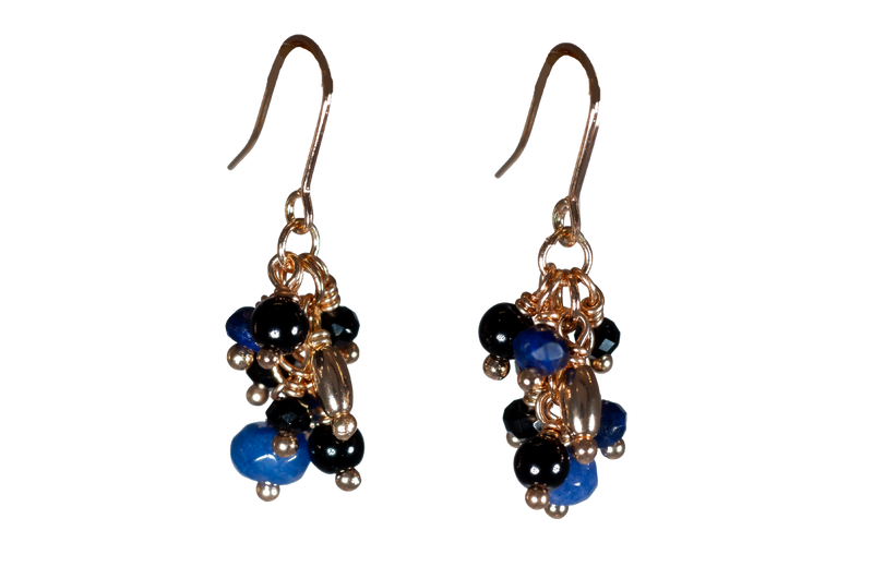 Multi-beaded Blue and Black Drop Earrings
&nbsp;Gold Coloured Fish-hooks, Rhodium Plated

Colour: Black, burgundy and purple
See matching Necklace LB40
Delivered in a soft, grey, velveteen pouch