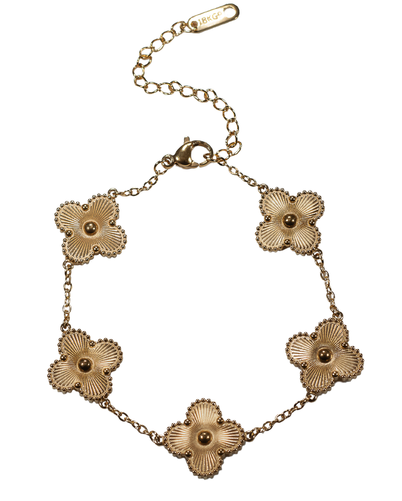 Enjoy designer quality at an affordable price with our 18K gold plated Four Leaf Clover Double-Sided Bracelet. This trending style lucky 4 leaf clover charm bracelet is the perfect gift for women. Matching earrings and necklaces are available separately.

Made from titanium steel with 18K gold plating. The charms are 13mm x 13mm. The chain is 16cm with an additional 5cm extension. Colour is golden.

Matching necklace MP20 and studs MP22

Delivered in a soft, grey, velveteen pouch