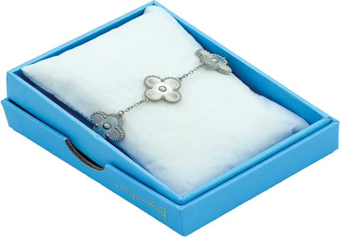 Enjoy designer quality at an affordable price with our Four Leaf Clover Double-Sided Bracelet in stainless steel. This trending style lucky 4 leaf clover charm bracelet is the perfect gift for women. Matching earrings and necklaces are available separately.

Made from titanium steel with 18K gold plating. The charms are 13mm x 13mm. The chain is 16cm with an additional 5cm extension. Colour is silver.

Delivered in a soft, grey, velveteen pouch