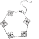 Enjoy designer quality at an affordable price with our Four Leaf Clover Double-Sided Bracelet in stainless steel. This trending style lucky 4 leaf clover charm bracelet is the perfect gift for women. Matching earrings and necklaces are available separately.

Made from titanium steel with 18K gold plating. The charms are 13mm x 13mm. The chain is 16cm with an additional 5cm extension. Colour is silver.

Delivered in a soft, grey, velveteen pouch