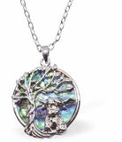 Natural Paua Shell Tree of Life with Highland Cow Necklace Hypoallergenic: Rhodium Plated, Nickel, Lead and Cadmium Free Greeny Blue in colour 22mm in size, 18" Rhodium Plated Chain See matching earrings P538 Delivered in a soft, black, velveteen pouch