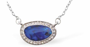 Paua Shell Elliptic Necklace
23mm, Rhodium Plated

18" Chain
Hypoallergenic: Nickel, Lead and Cadmium free
Delivered in a soft, black, velveteen pouch