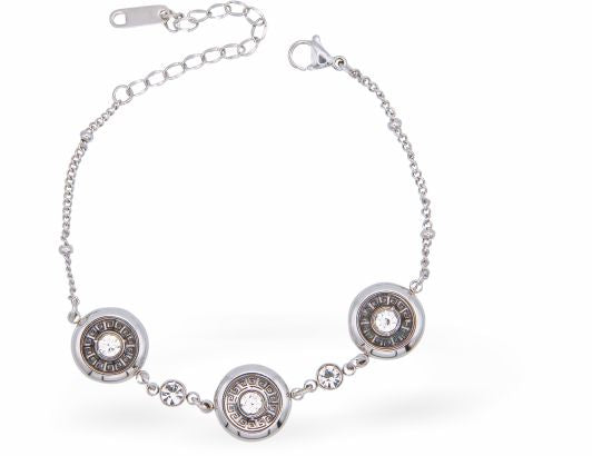 Special PVD Chain Bracelet with Three Dancing Dot Filled Circles
Hypoallergenic; Free from cadmium, lead and nickel

Colour: Silver Coloured&nbsp;
Delivered in a soft, black, velveteen pouch