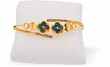 Special PVD Golden Coloured Bangle Bracelet with Central Clovers.