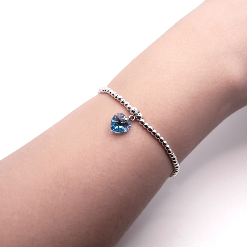 Charm Bracelet with Crystal Heart Charm Embellished with Crystals by Swarovski®  in Aquamarine Blue, Rhodium Plated