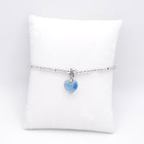 Charm Bracelet with Crystal Heart Charm Embellished with Crystals by Swarovski®  in Aquamarine Blue, Rhodium Plated