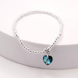 Charm Bracelet with Crystal Heart Charm Embellished with Crystals by Swarovski® in Bermuda Blue, Rhodium Plated