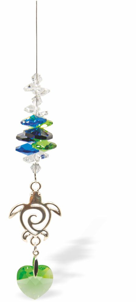 Austrian Crystal Suncatcher, Multi -faceted
Peridot Green Heart Drop and Turtle Link
Green, Blue and Clear crystals
Delivered in a soft, black, velveteen pouch