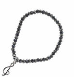 Stretch Charm Bracelet with Granite Grey Coloured Beads, Rhodium Plated, a Treble Clef Charm