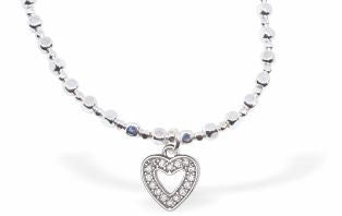 Stretch Charm Bracelet Crystal Hollow Heart Charm Rhodium Plated Hypo allergenic, free from cadmium, lead and nickel Delivered in a soft black velveteen pouch