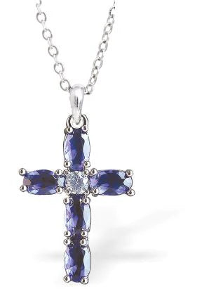 Silver Coloured Sapphire Cross Necklace Hypo allergenic: Free from Lead, Nickel and Cadmium  20mm in size Colour: Silver Coloured and Sapphire Blue Chain: Choice of Stainless Steel Chain (18") or Sterling Silver Chain (18") Delivered in a soft, black, velveteen pouch