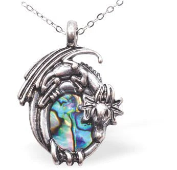Paua Shell Celtic Dragon Necklace Hypoallergenic: Nickel, Lead and Cadmium Free 24mm in size, with 18" chain Rhodium Plated Delivered in a soft, black, velveteen pouch