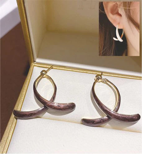 Artisan Delicate Wishbone Shaped Drop Earrings in Taro Purple Stoving Varnish Golden Coloured Titanium Steel 30mm in size Hypoallergenic: Nickel, Lead and Cadmium Free Delivered in a soft, black, velveteen pouch 