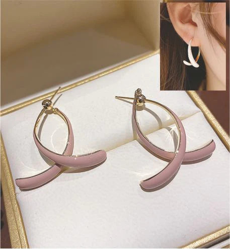 Artisan Delicate Wishbone Shaped Drop Earrings in Pink Stoving Varnish Golden Coloured Titanium Steel 30mm in size Hypoallergenic: Nickel, Lead and Cadmium Free Delivered in a soft, black, velveteen pouch