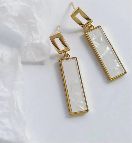 Artisan Delicate Rectangular Drop Earrings in White Golden Coloured Titanium Steel 45mm in size Hypoallergenic: Nickel, Lead and Cadmium Free Delivered in a soft, black, velveteen pouch 