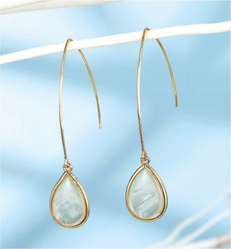 Artisan Delicate White Shell Drop Earrings on Long Half Hoop Golden Coloured Titanium Steel 20mm drop Hypoallergenic: Nickel, Lead and Cadmium Free Delivered in a soft, black, velveteen pouch 