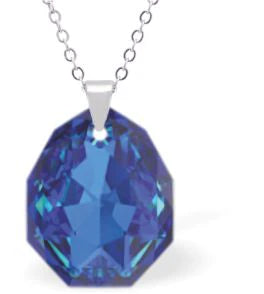 Austrian Crystal Multi Faceted Majestic Drop Necklace Bermuda Blue Shimmer in Colour 16mm in size Choice of Sterling Silver or Steel Chain, 18" See matching drop earrings MA17 Delivered in a soft, black, velveteen pouch