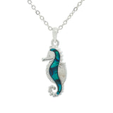Natural Paua Shell Cute Swimming Seahorse Necklace, by Byzantium. Rhodium Plated and 24mm in size